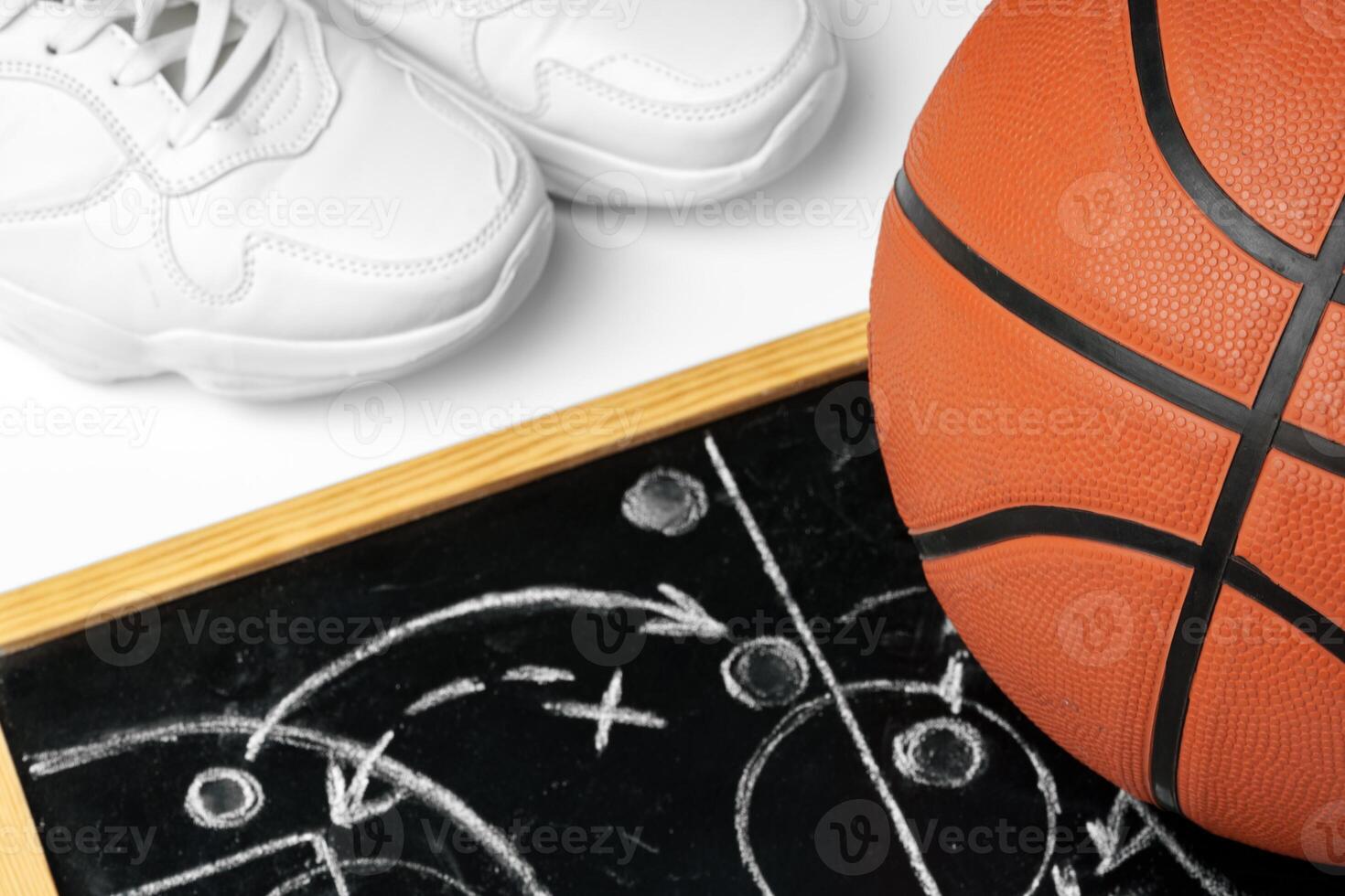 Basketball ball with chalkboard strategy planning close up photo