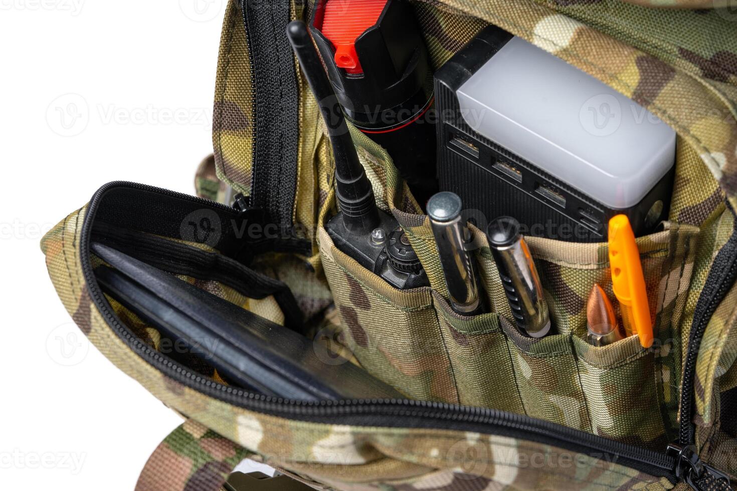 Open military backpack of khaki color on a white background photo
