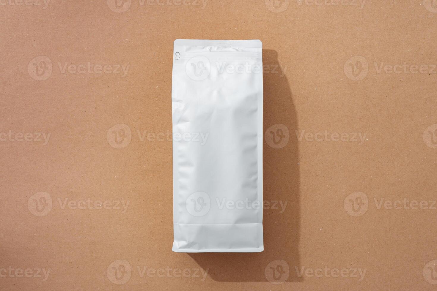 White blank matte coffee package on paper background photo