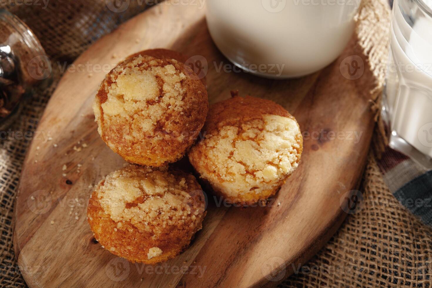Glass of milk and cookies on table photo