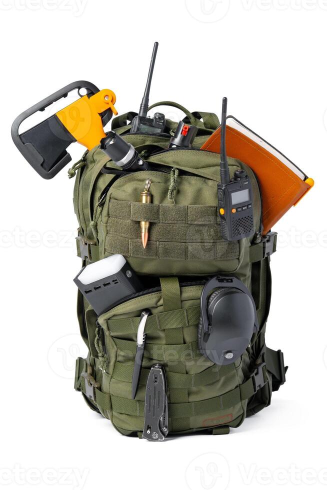 Open military backpack of khaki color on a white background photo