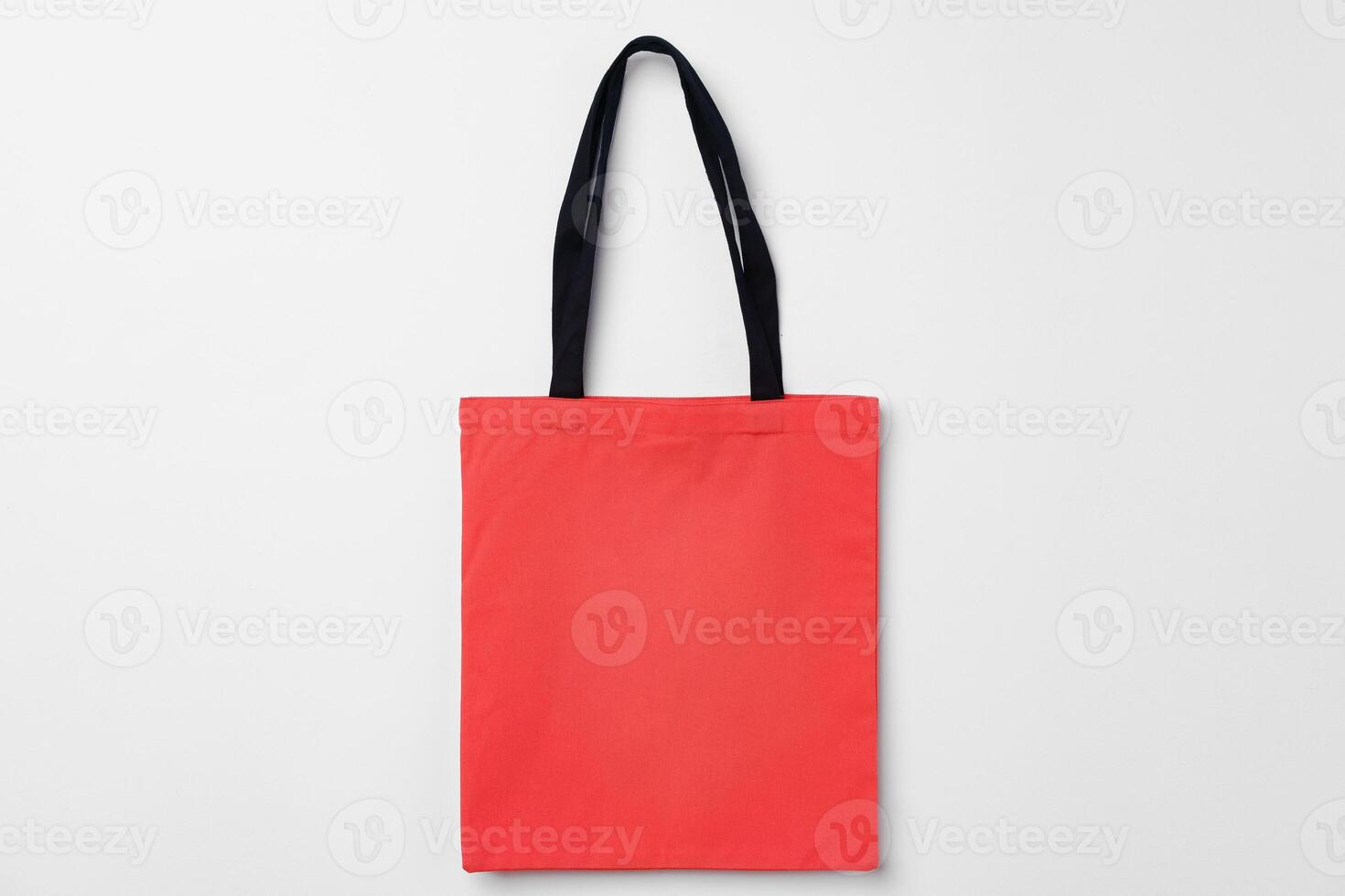 Empty fabric shopping bag on white background photo