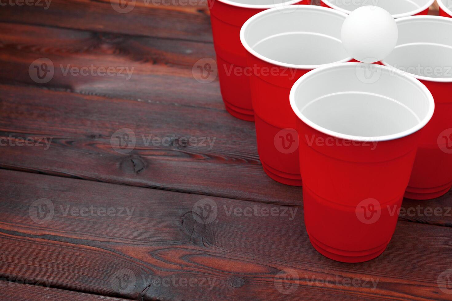 Cups for game Beer Pong on the table photo
