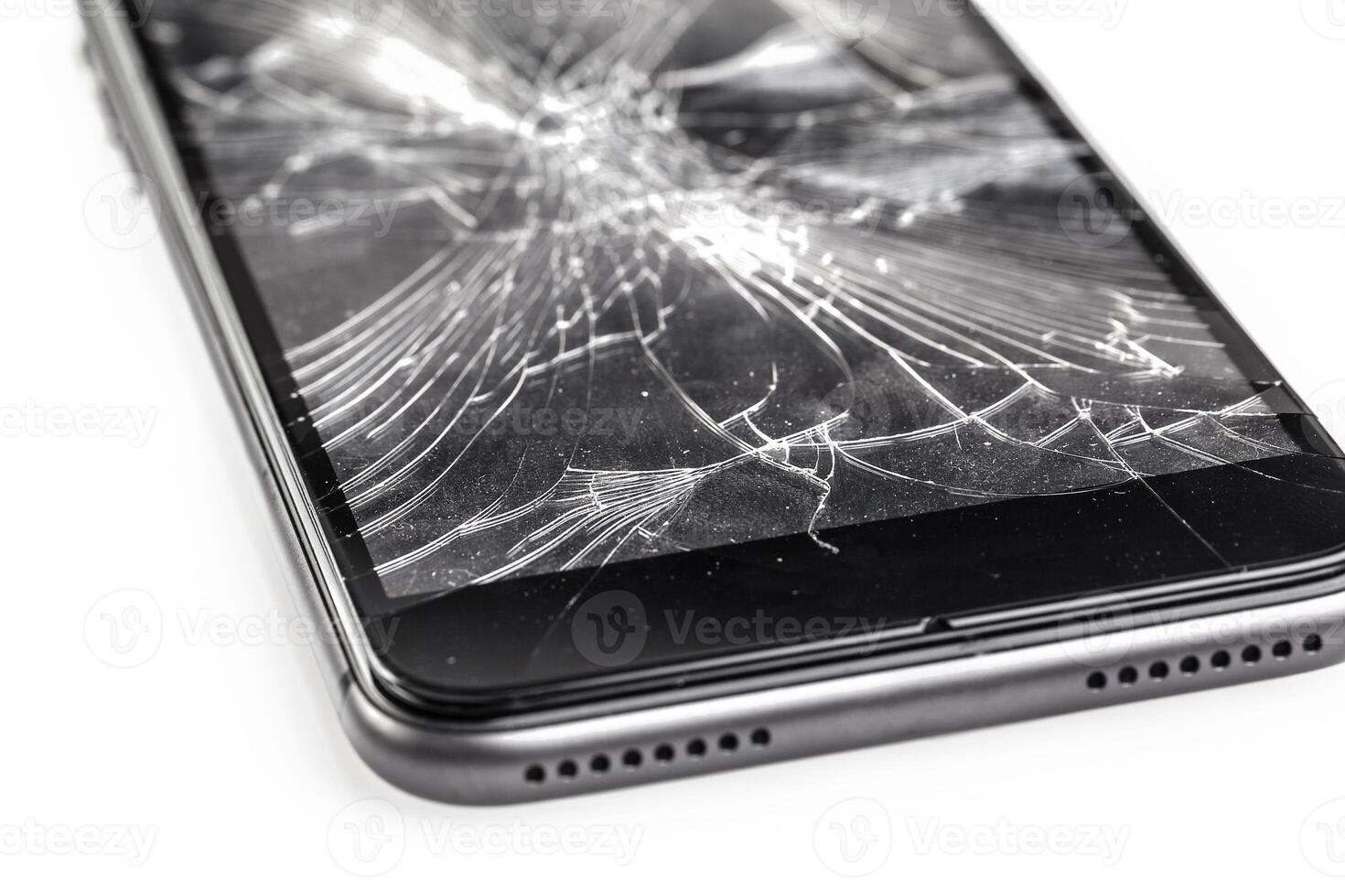 Mobile phone with broken screen photo