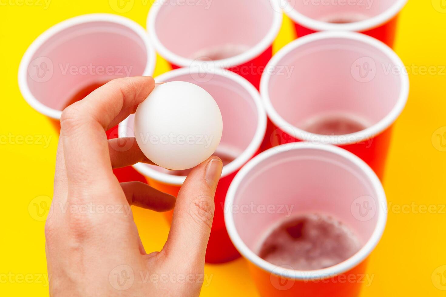 Cups for game Beer Pong on the table photo