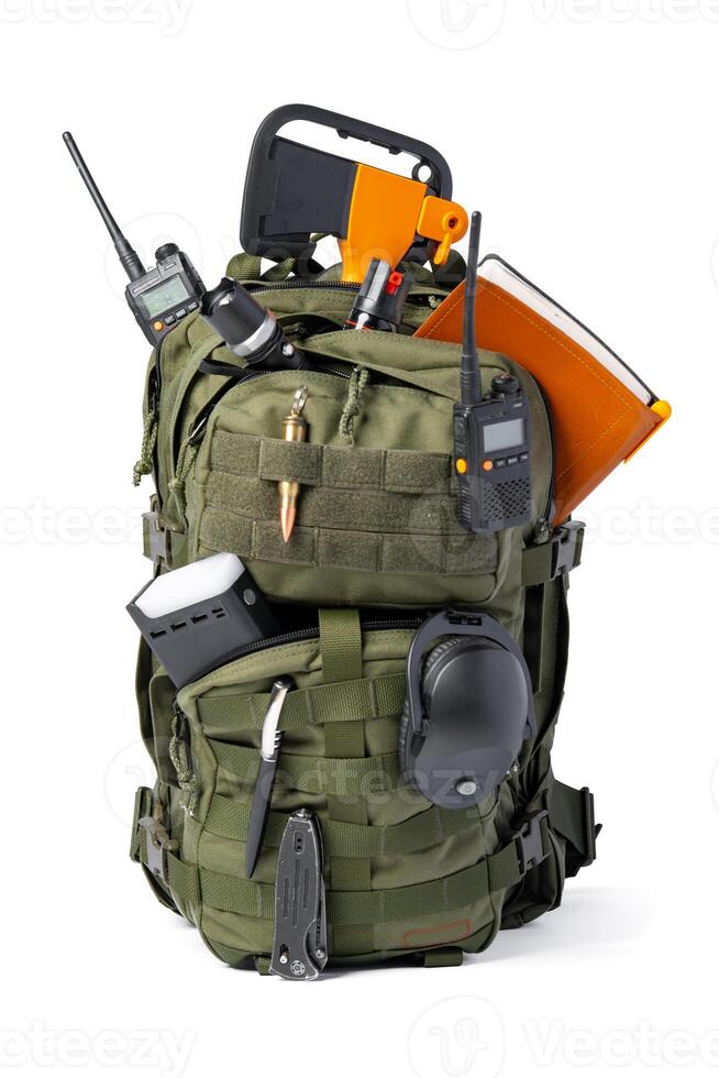Open military backpack of khaki color on a white background photo
