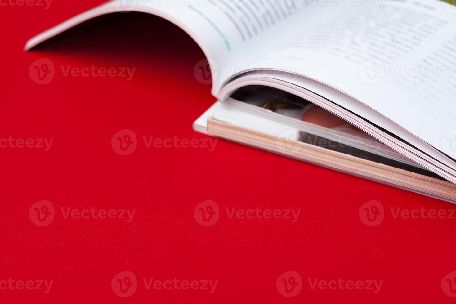 Close up stacking magazine place on table background photo
