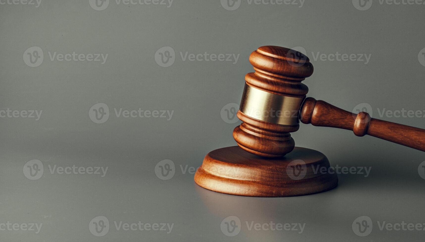 Judge gavel close up on paper background. Law and justice, legality concept photo
