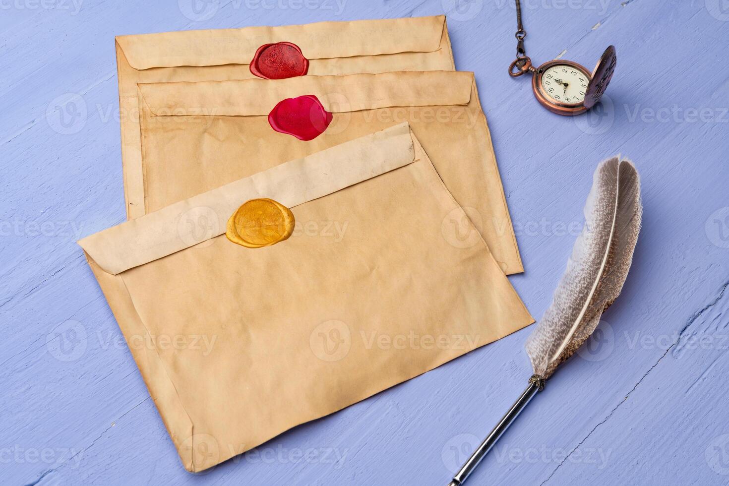 Handmade paper envelope on lavender wooden table photo