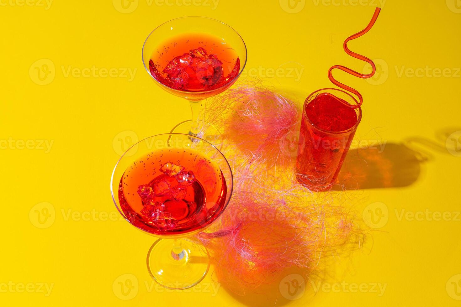 Pink summer cocktails on color background close up photo