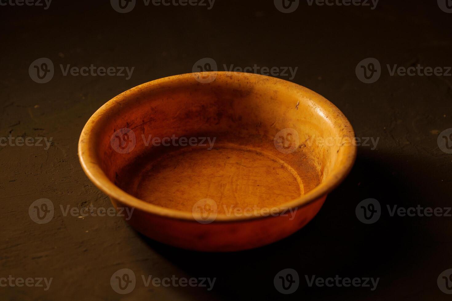 Empty bowl on dark background with copy space photo