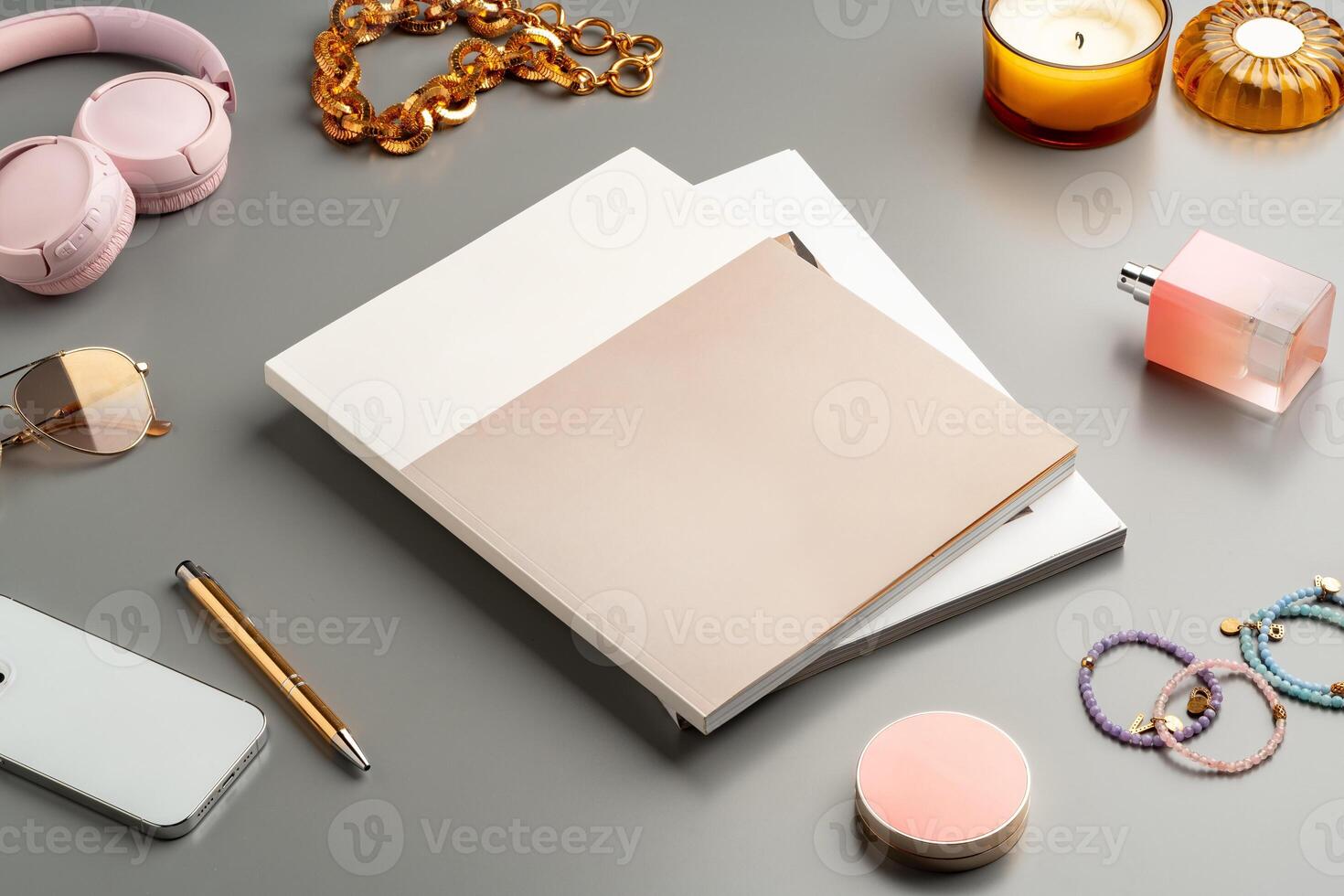 Creative workspace arrangement featuring stationery, accessories, and ambient lighting on a stylish table photo