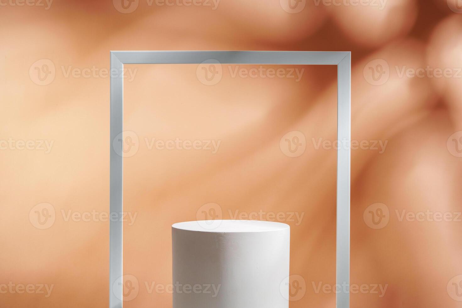 Minimalistic display of a white cylindrical object framed by a white rectangular border against a soft orange background photo
