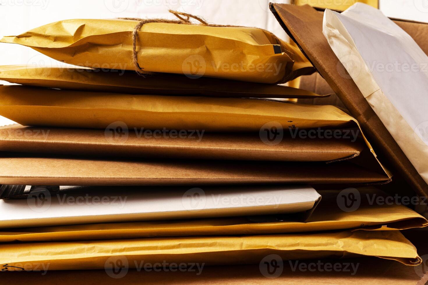 Close up shot of stack of padded mailing envelopes photo