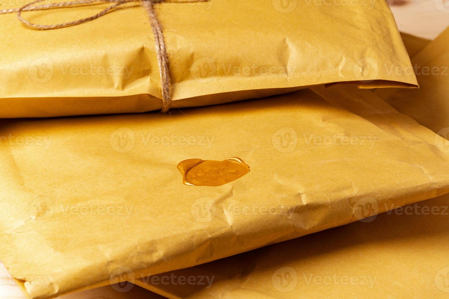 Close up shot of stack of padded mailing envelopes photo