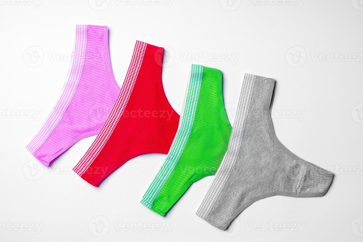 Set of cotton string women's panties on white background photo