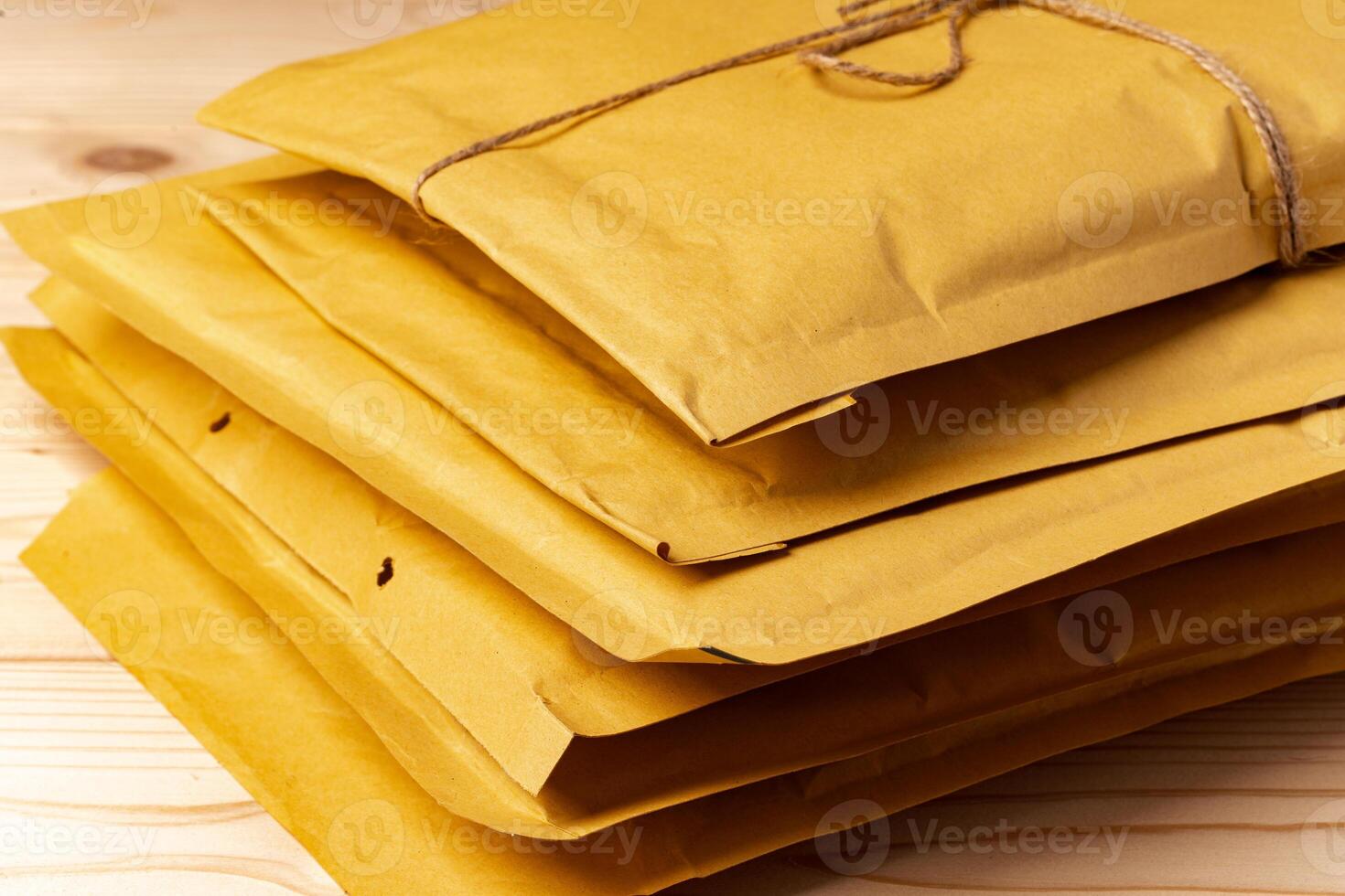 Close up shot of stack of padded mailing envelopes photo