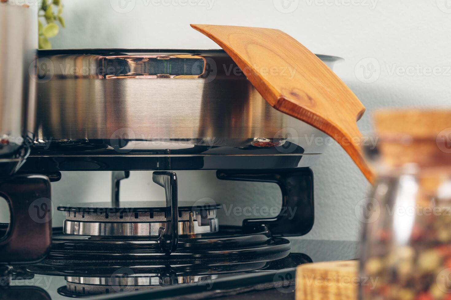 Clean saucepan on a gas stove in kitchen photo