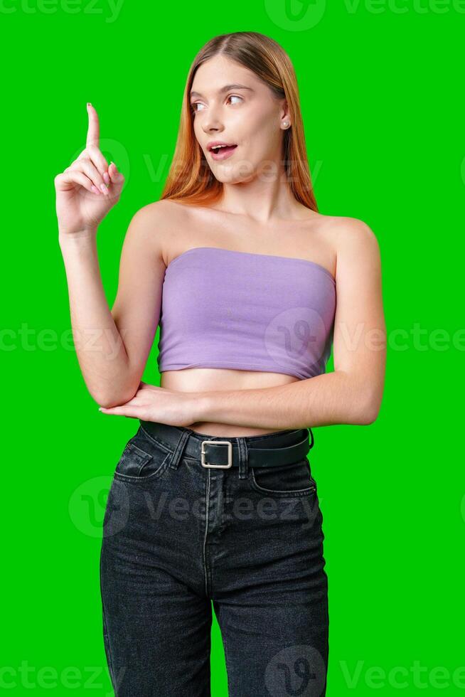 Young Woman With Long Hair Pointing To Copy Space photo