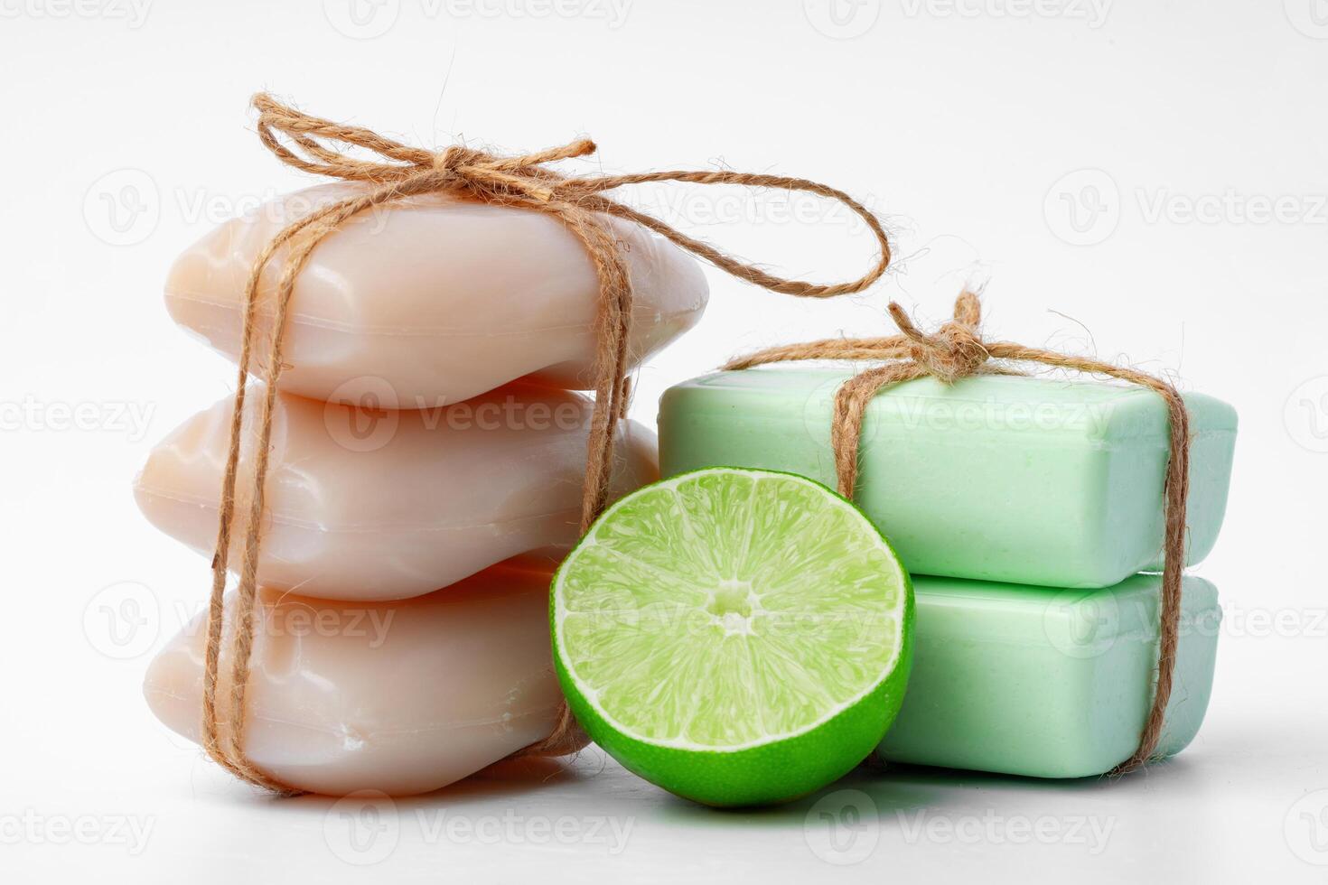 Handmade soap with lime on a white background photo