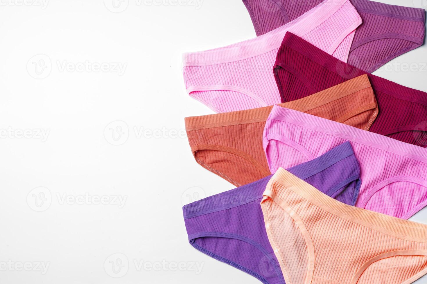 Set of colorful cotton classic women's panties on white background photo