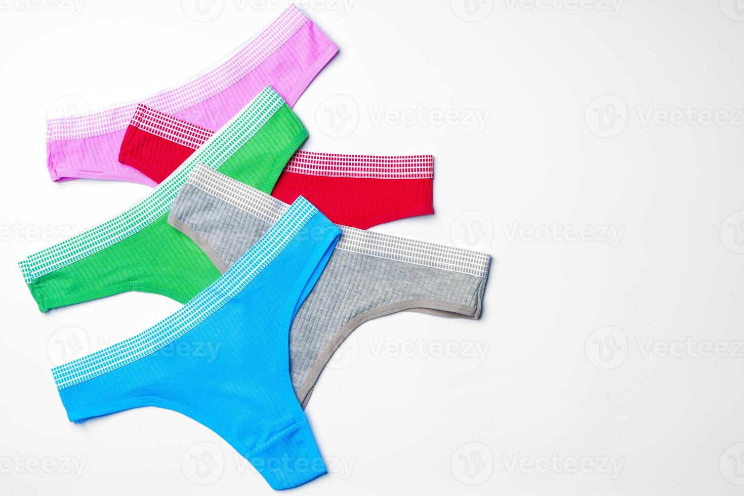 Set of cotton string women's panties on white background photo
