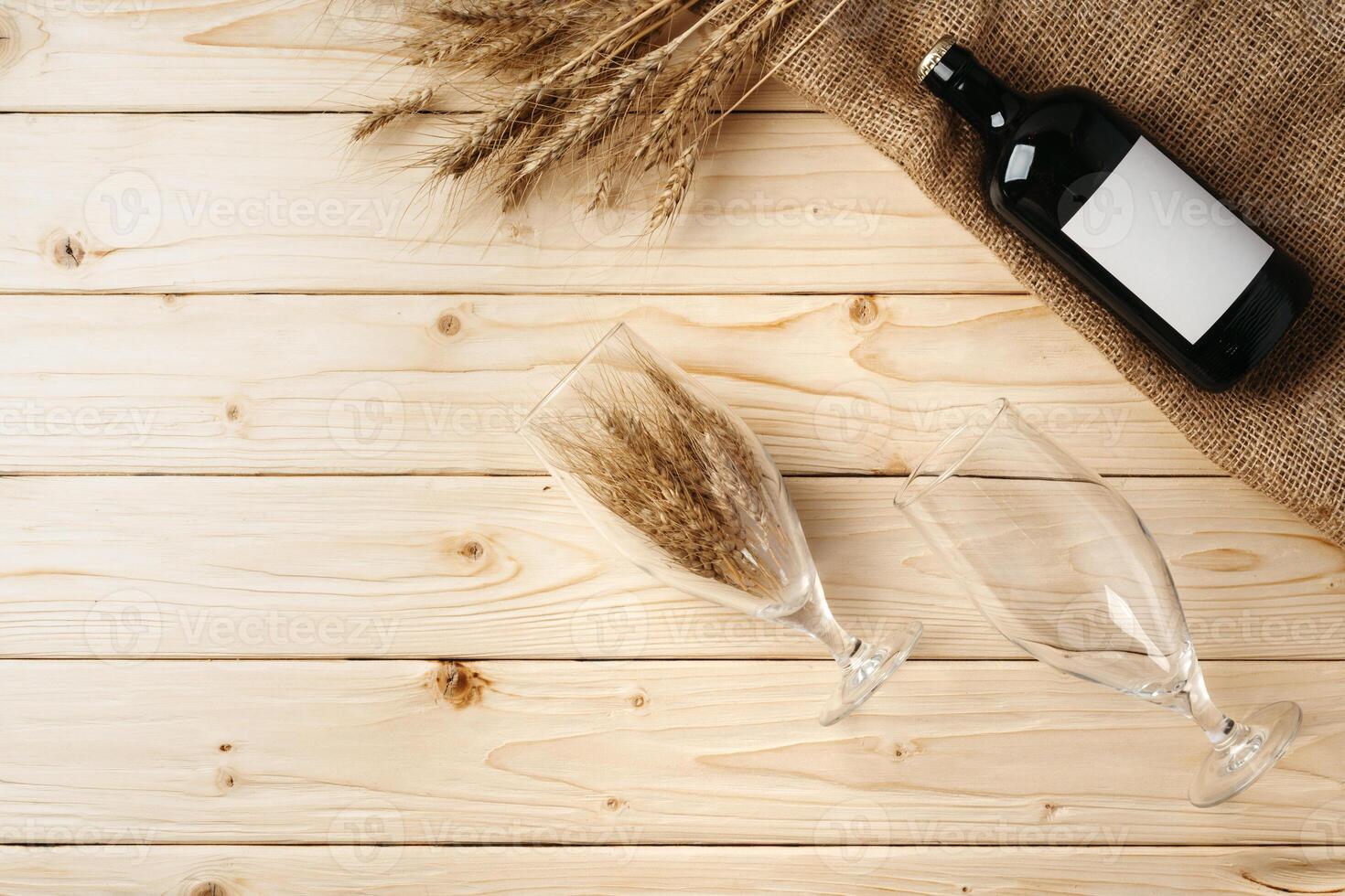 A bottle of beer and grain. Top view. Free space for text. photo