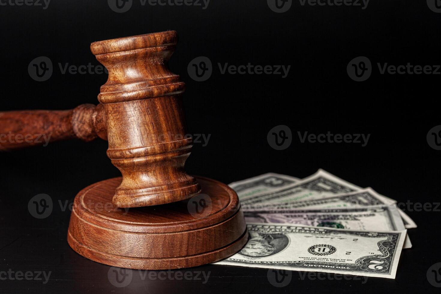 Law mallet and a stack of money photo