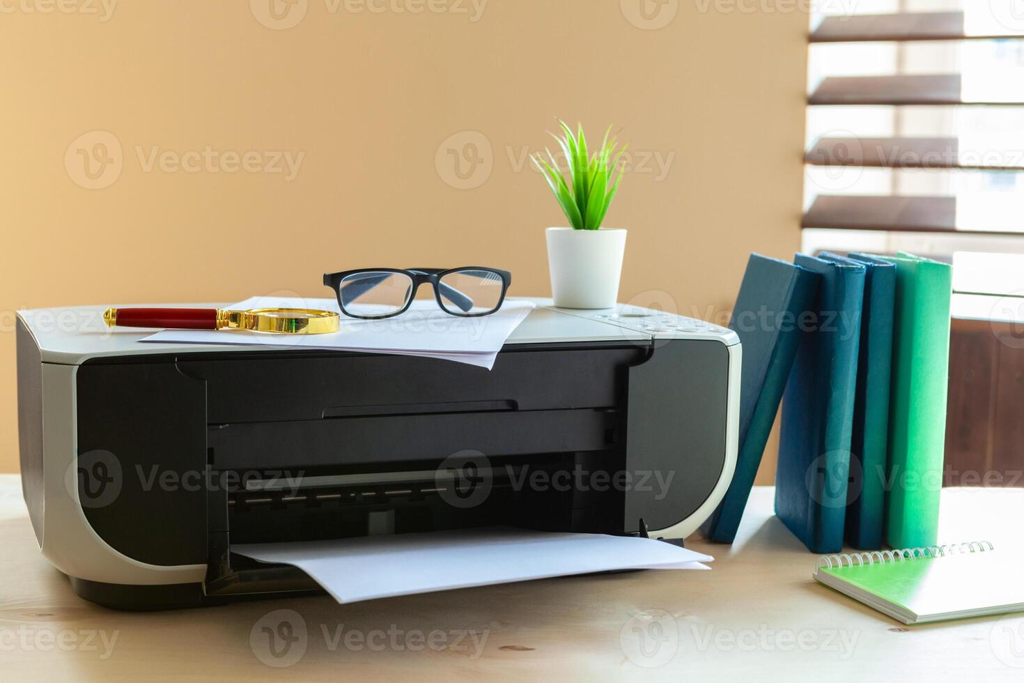 Close up of an office table with printer on it photo