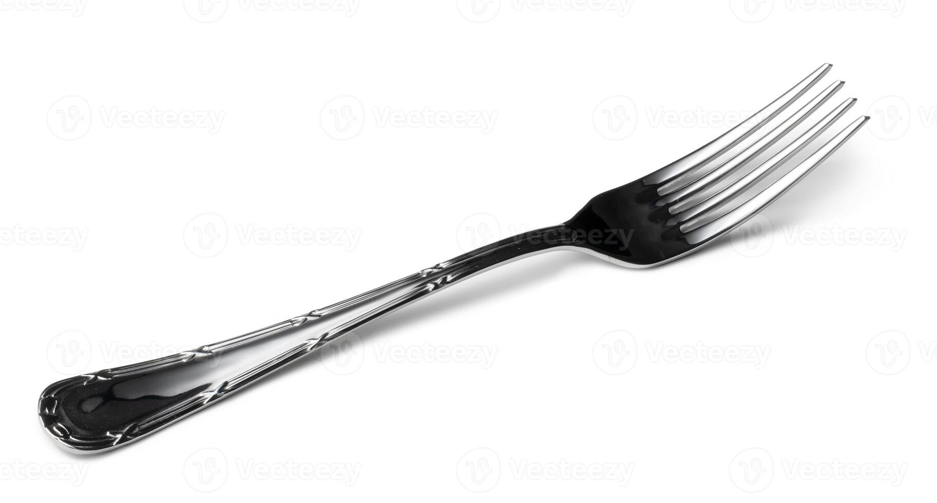 Silver cutlery fork isolated on white background photo