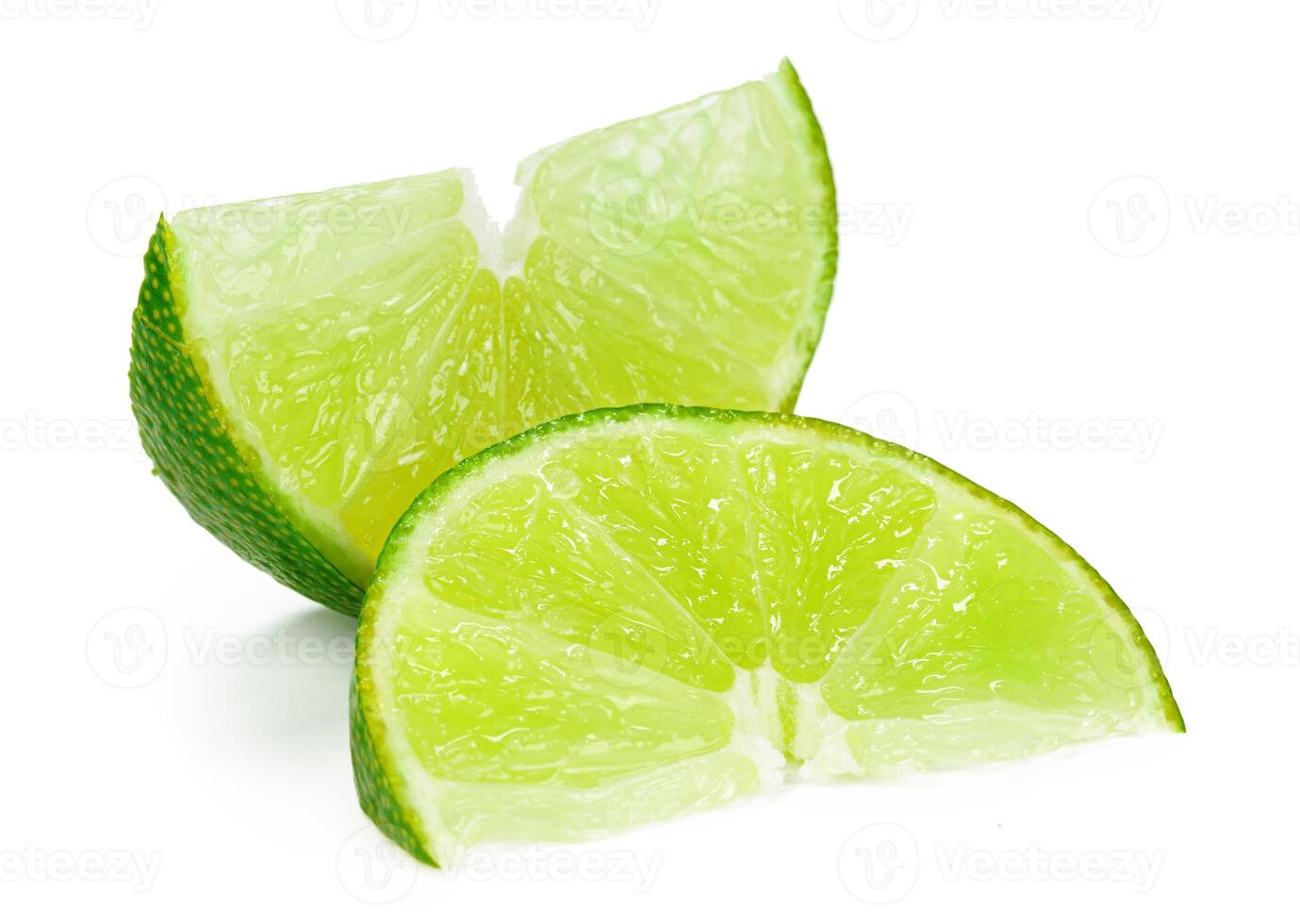 Pieces of lime isolated on white background photo