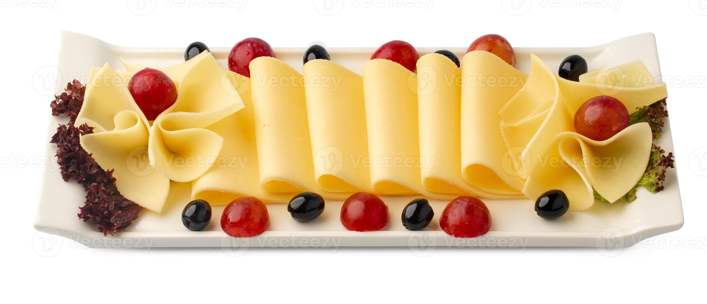 Cheese plate served with tomatoes and olives isolated on white photo