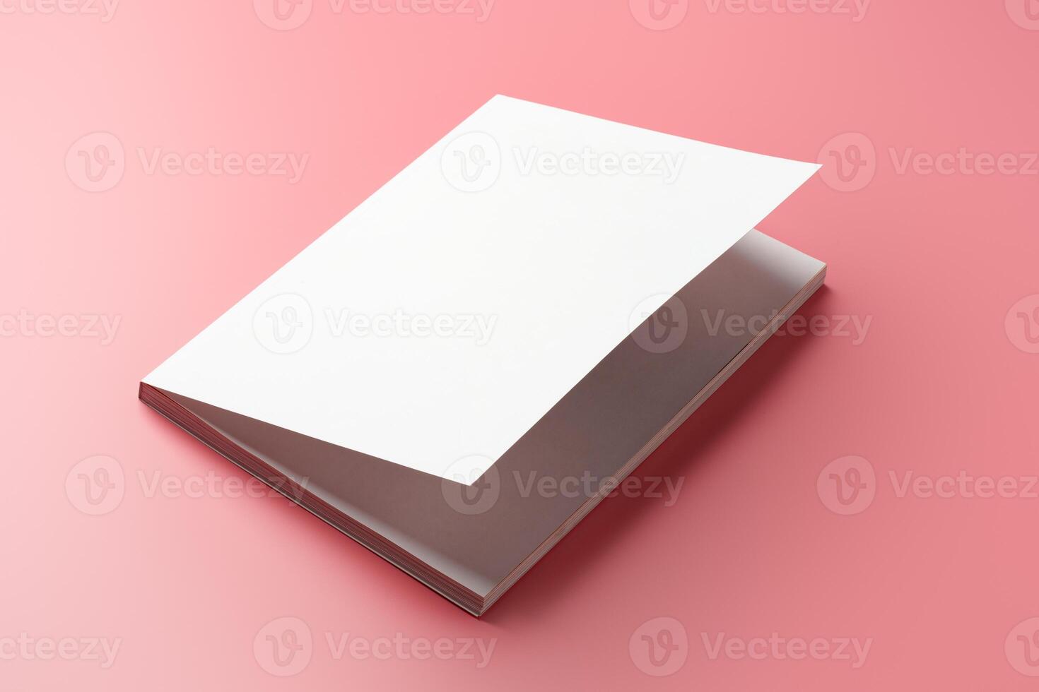A Collection of Blank Papers Stacked on a Pink Surface for Creative Projects photo
