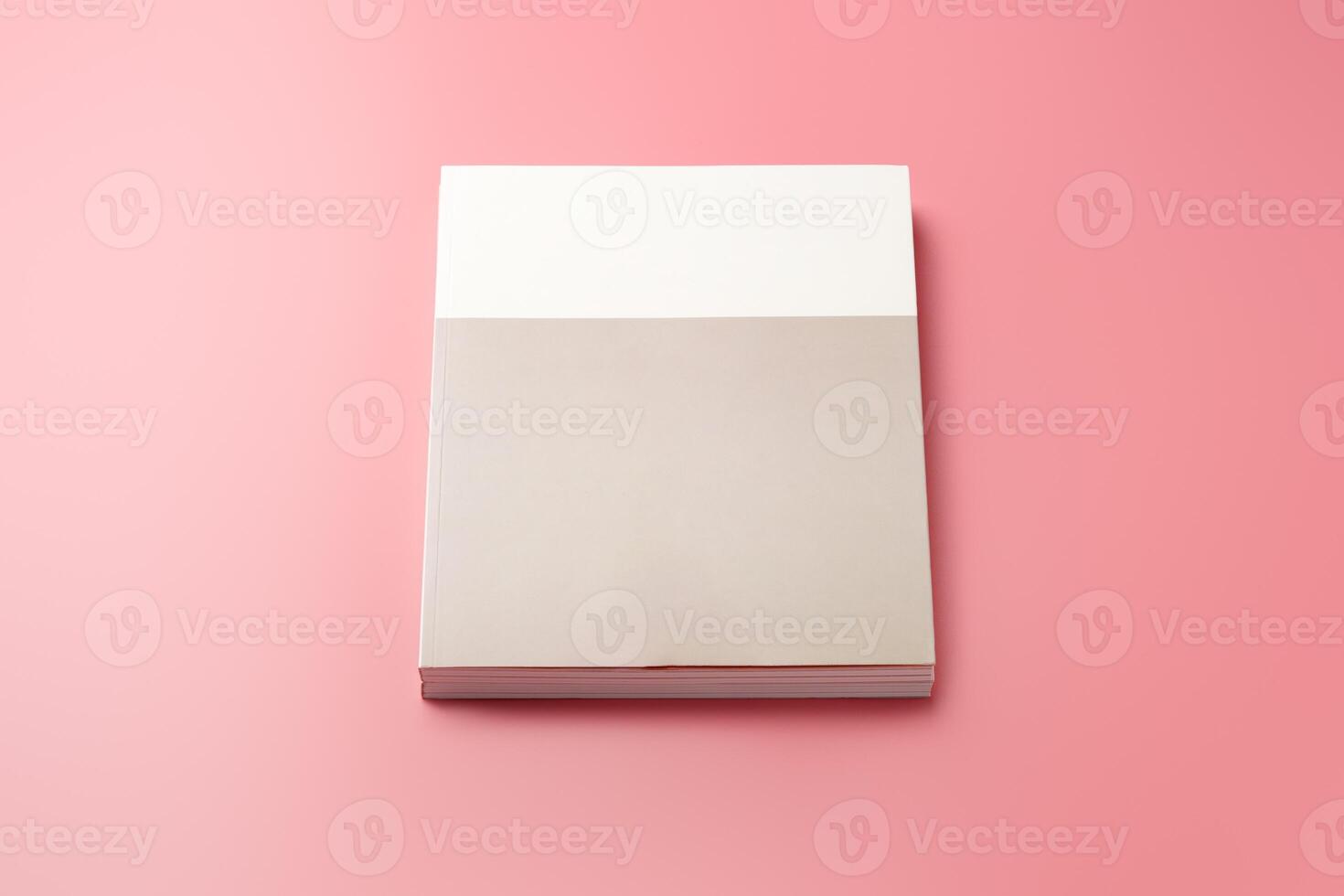 A Collection of Blank Papers Stacked on a Pink Surface for Creative Projects photo