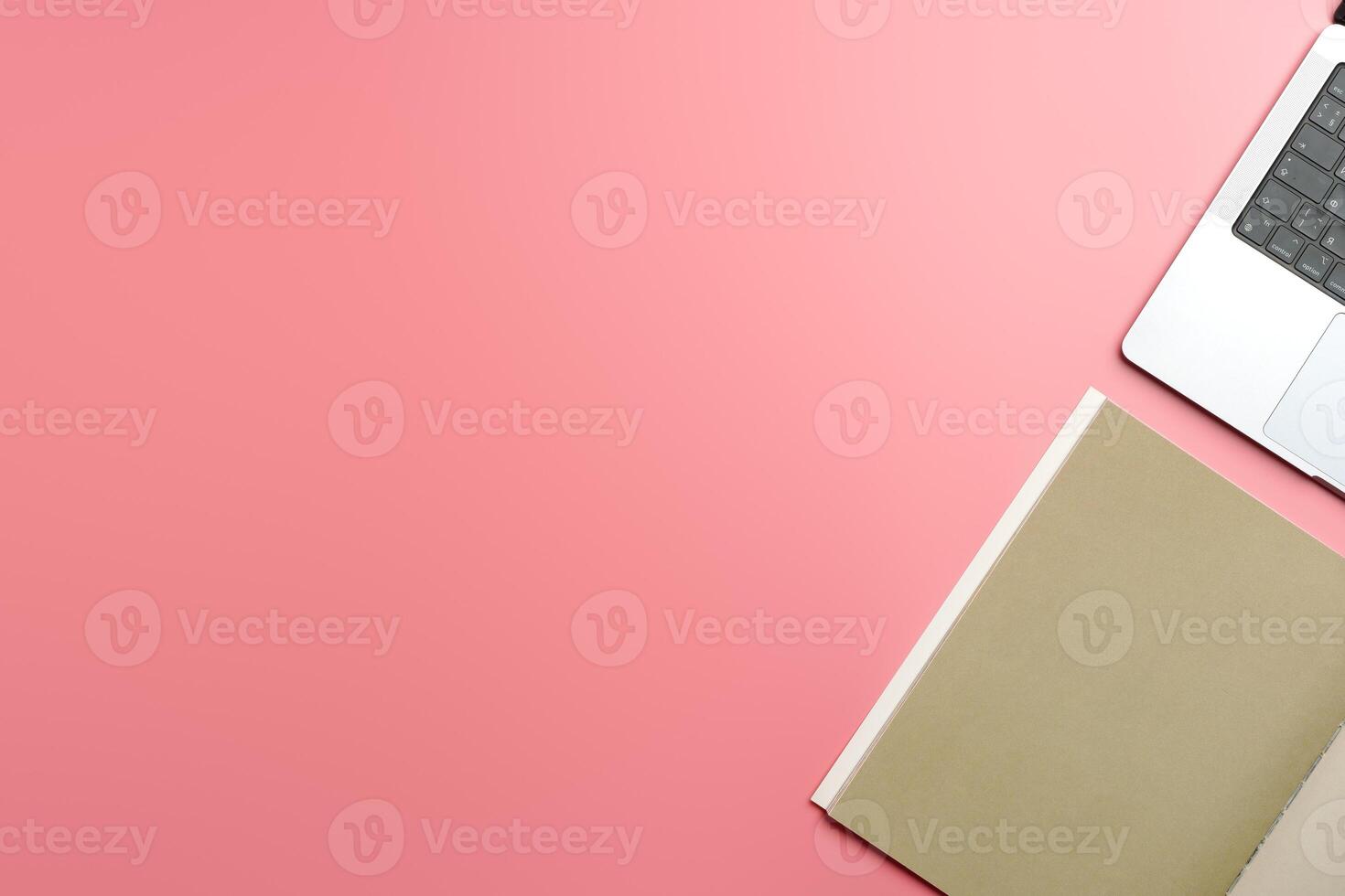 A Collection of Blank Papers Stacked on a Pink Surface for Creative Projects photo