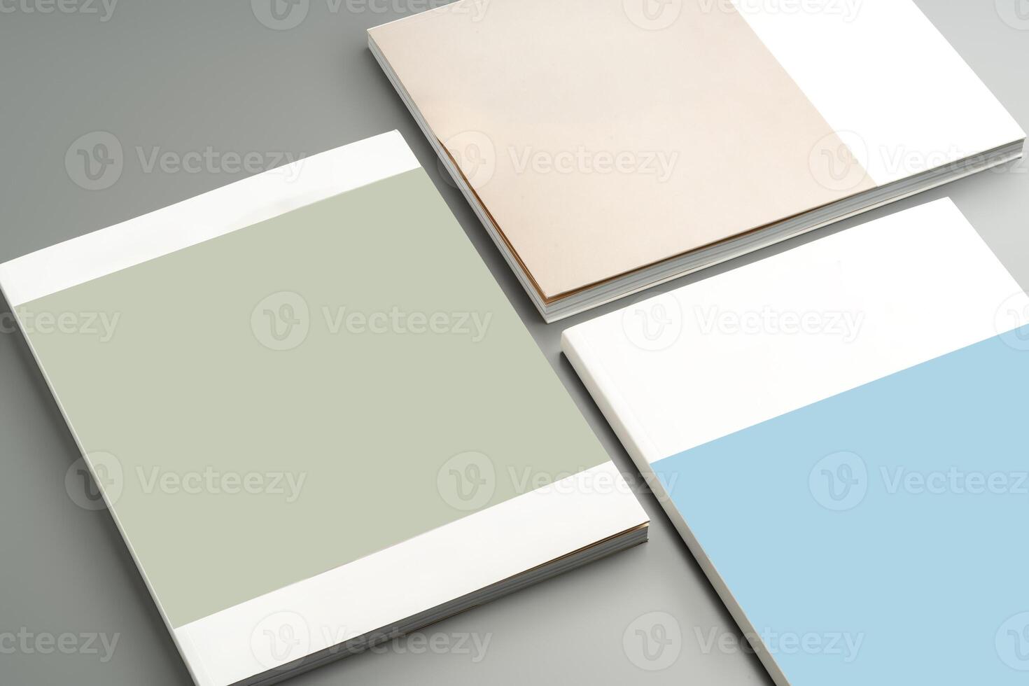 Various color swatches neatly arranged on a gray surface showcasing different shades and finishes in natural light photo