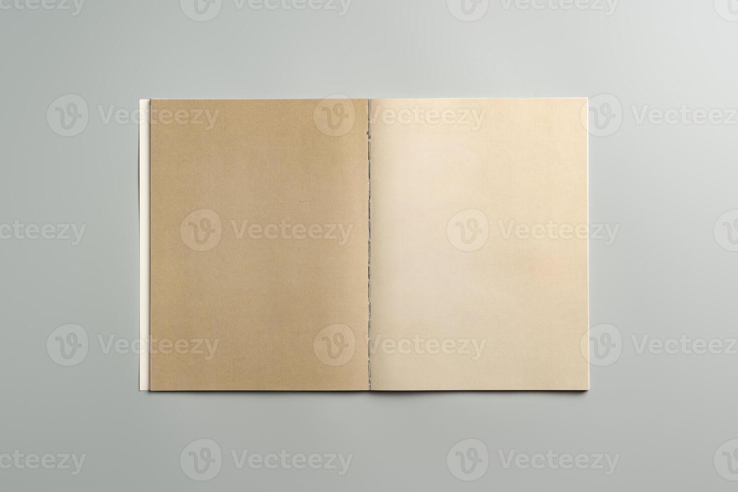 Open Blank Notebook on Minimalist Desk Surface in Soft Natural Light During Daytime photo