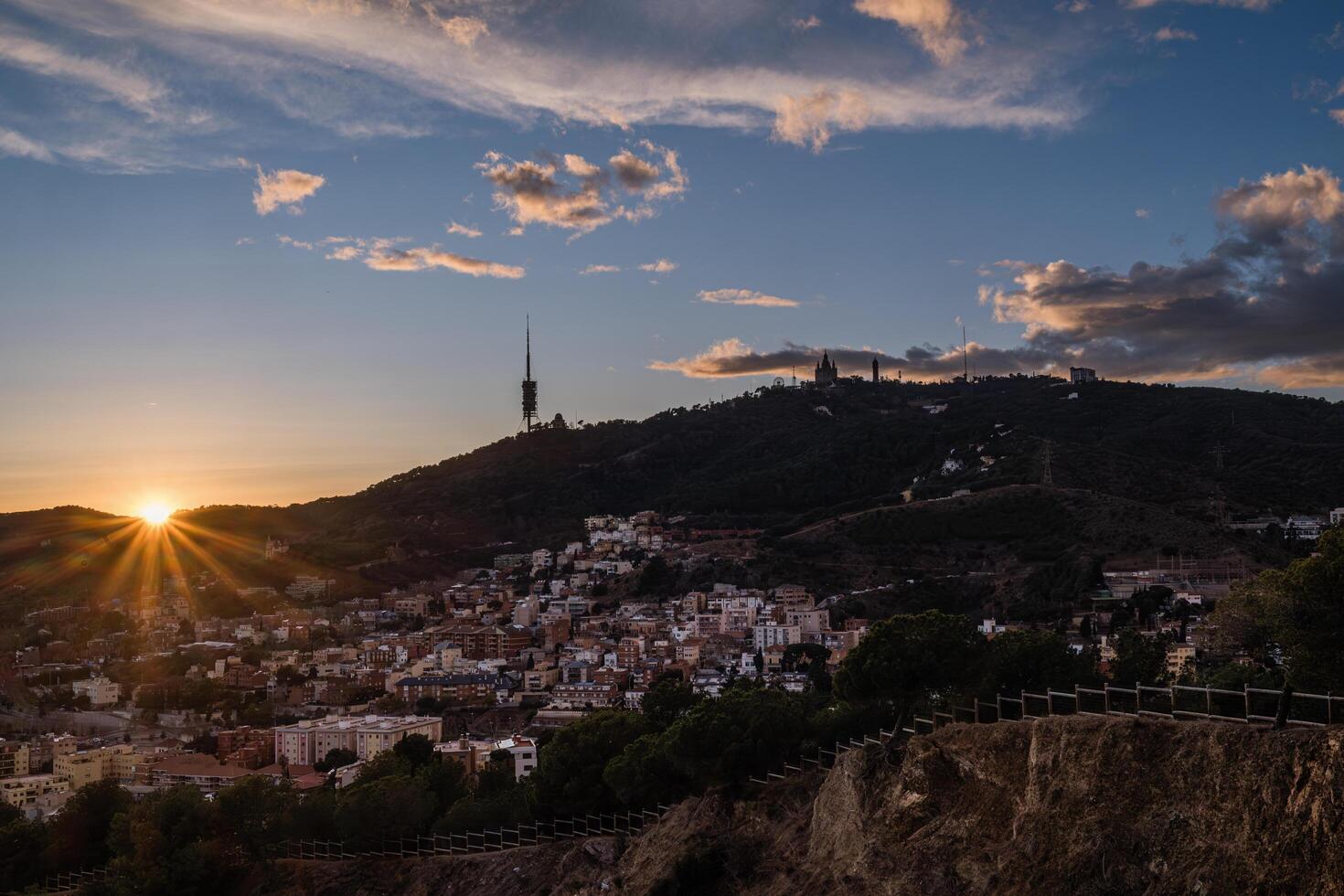 Evening sunset over Tibidabo, the highest peak of the Collserola mountain range in the municipality of Barcelona, in Spain. photo