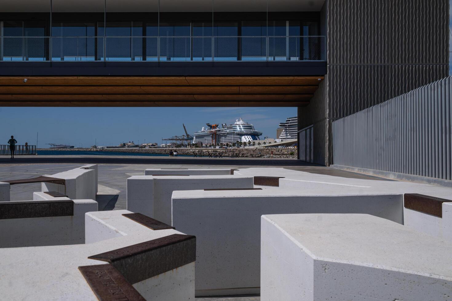 Majestic view of Barcelona's port complex. In the background the area called Moll Adossat, Connected Pier, used for the berthing of cruise ships. photo