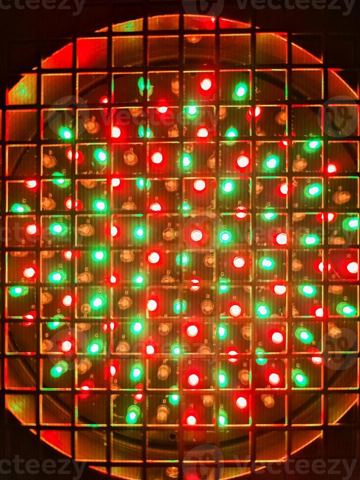 Close up view of a colorful spotlight with the LEDs and small RGB designations. photo