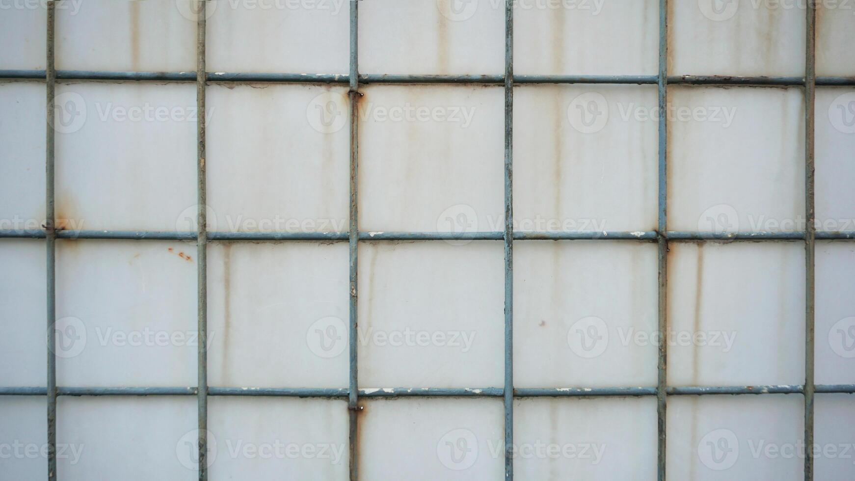abstract background texture of old rusty metal wall with a lattice photo