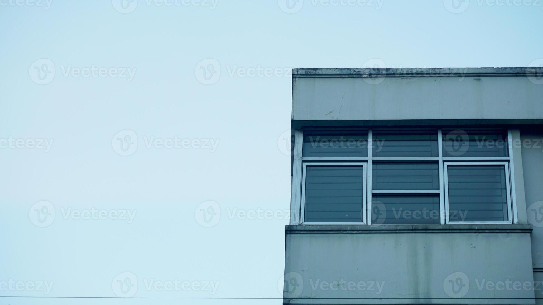 Detail of the facade of a modern office building with windows. Space for text. photo