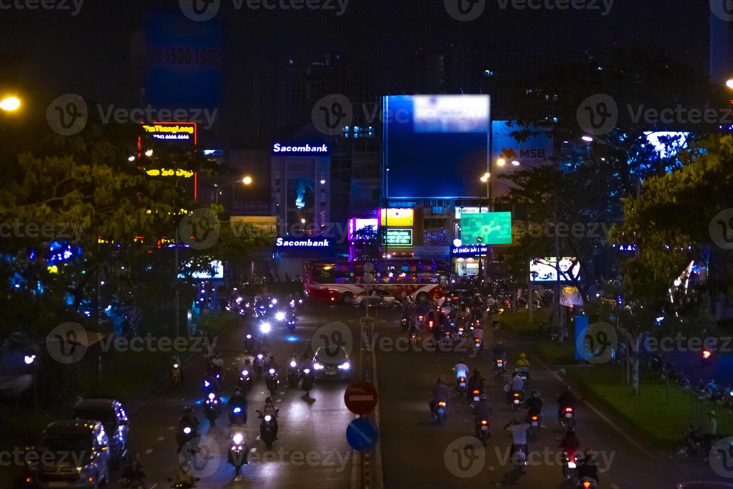 A night neon street at the downtown in Ho Chi Minh Vietnam long shot photo