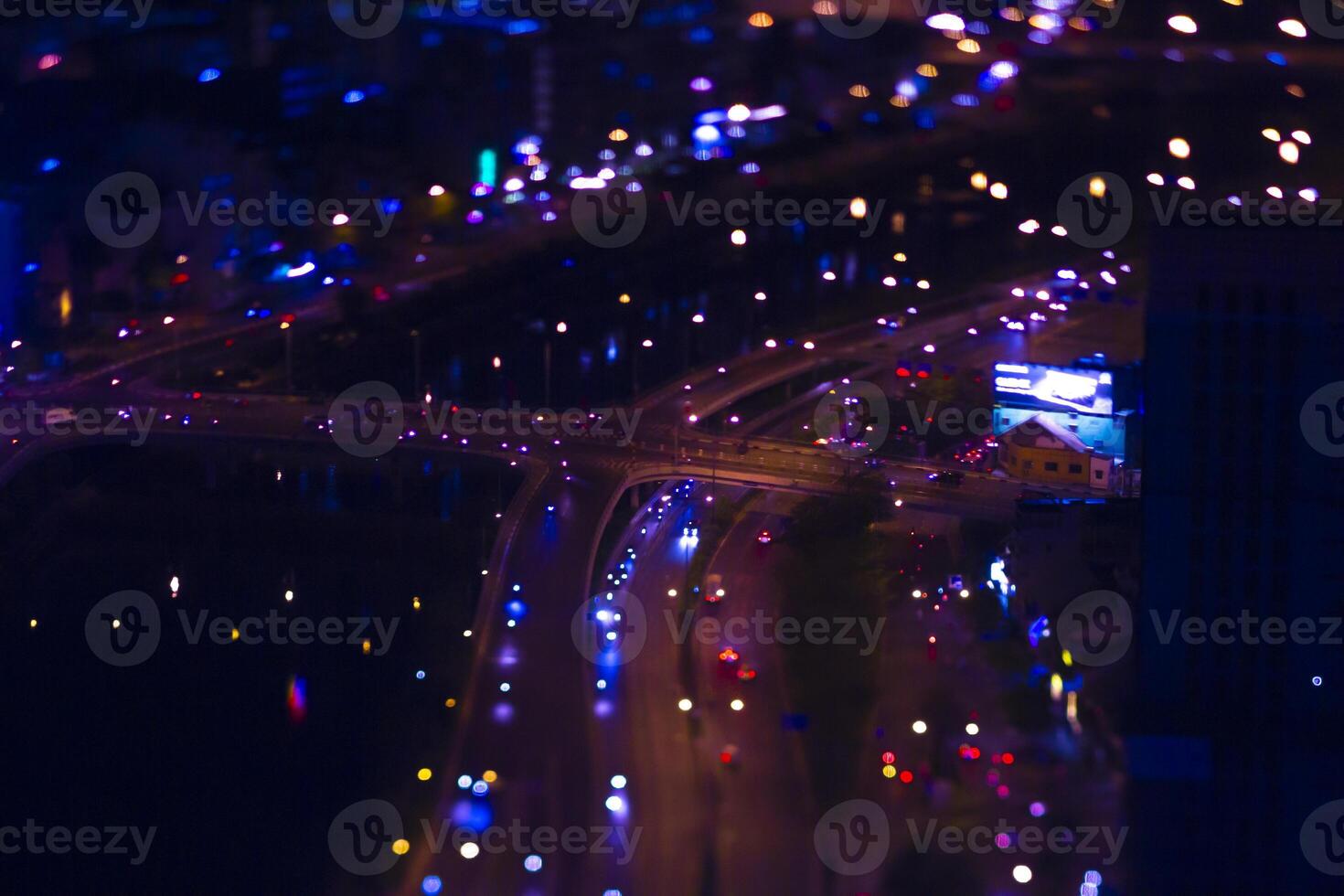A night miniature traffic jam in Ho Chi Minh Vietnam high angle tiltshift photo