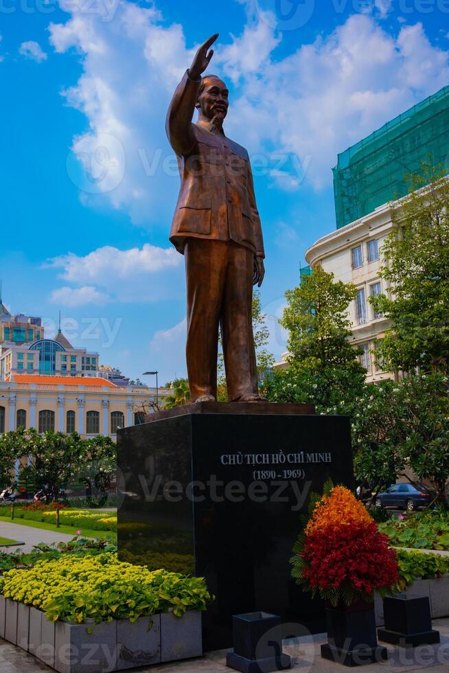 A statue of Ho Chi Minh at Guyen hue street in Ho Chi Minh City photo