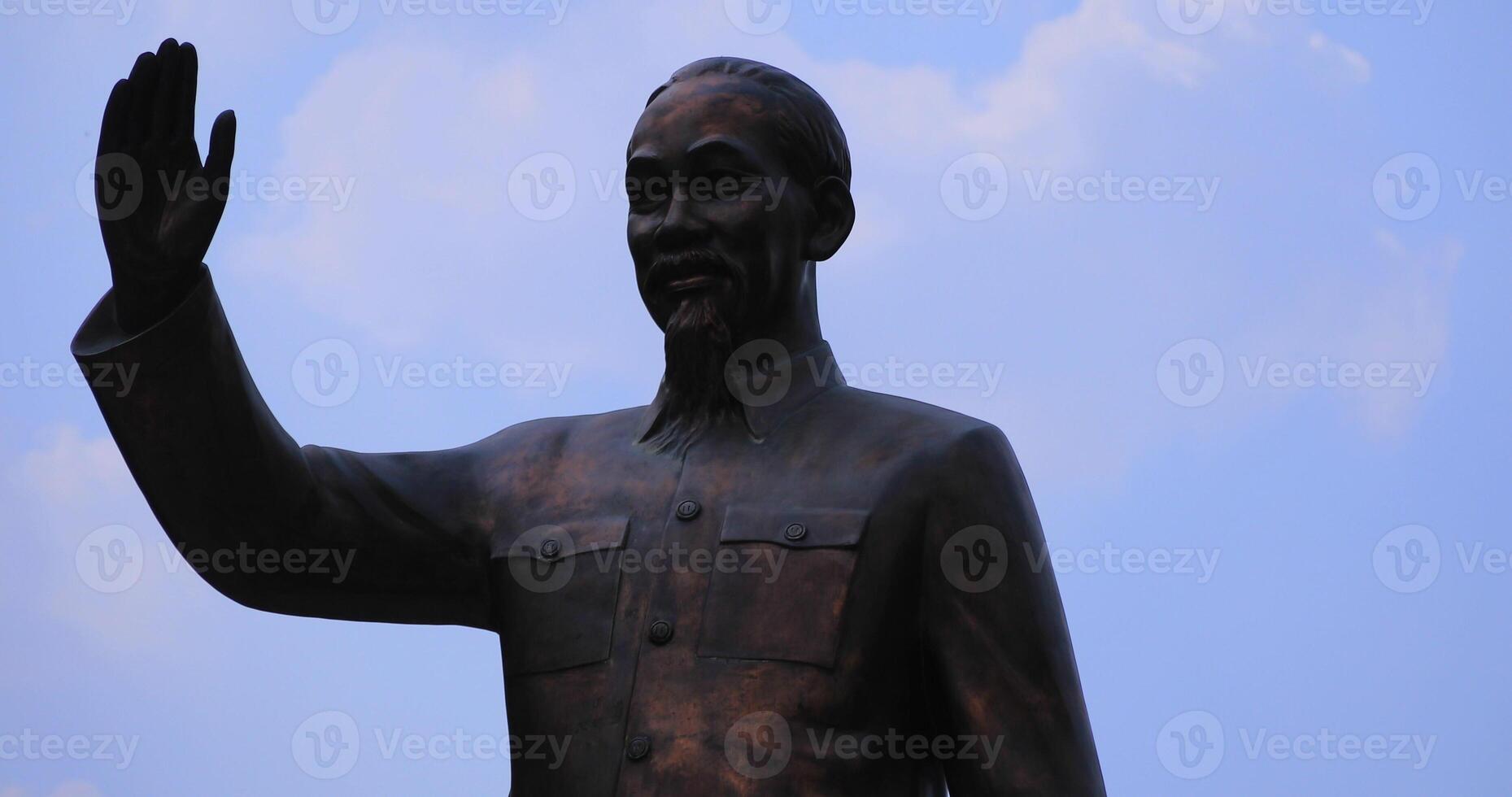 A statue of Ho Chi Minh at Guyen hue street in Ho Chi Minh City handheld photo