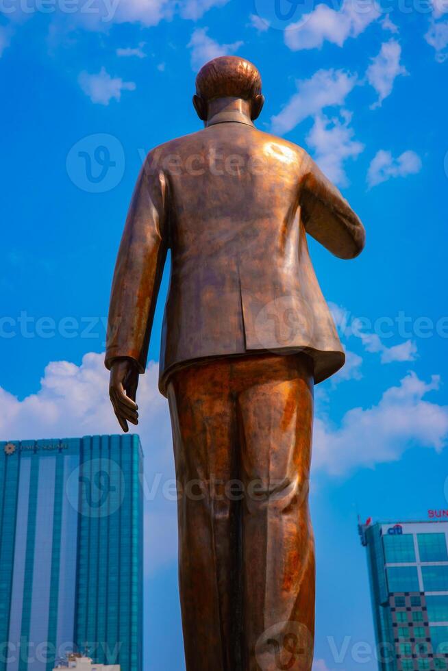 A statue of Ho Chi Minh at Guyen hue street in Ho Chi Minh City photo