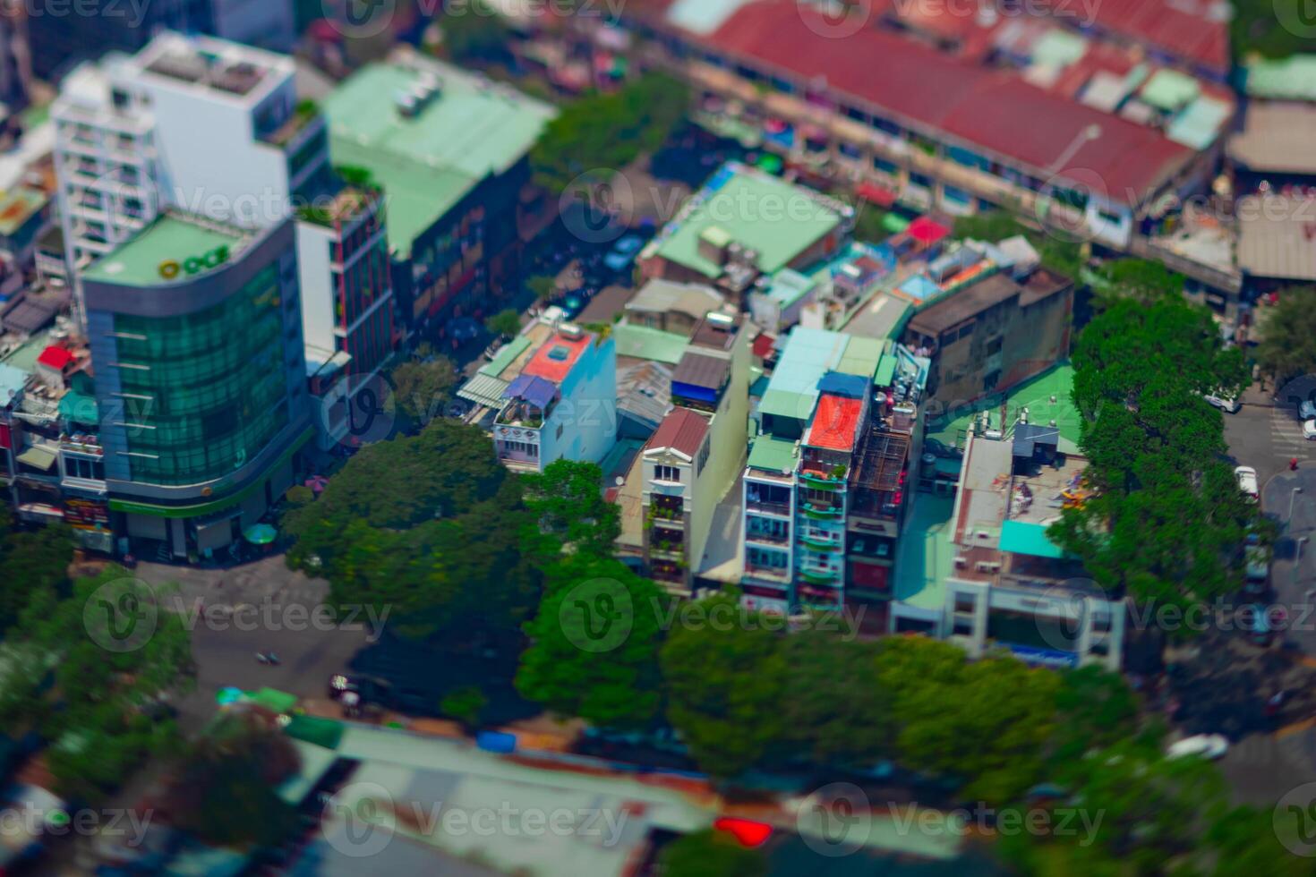 A high angle view of miniature cityscape at the downtown in Ho Chi Minh daytime tiltshift photo