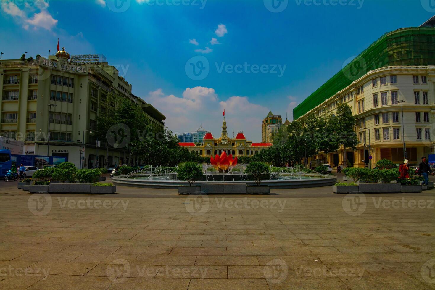 A fountain at the downtown at Nguyen Hue street in Ho Chi Minh wide shot photo