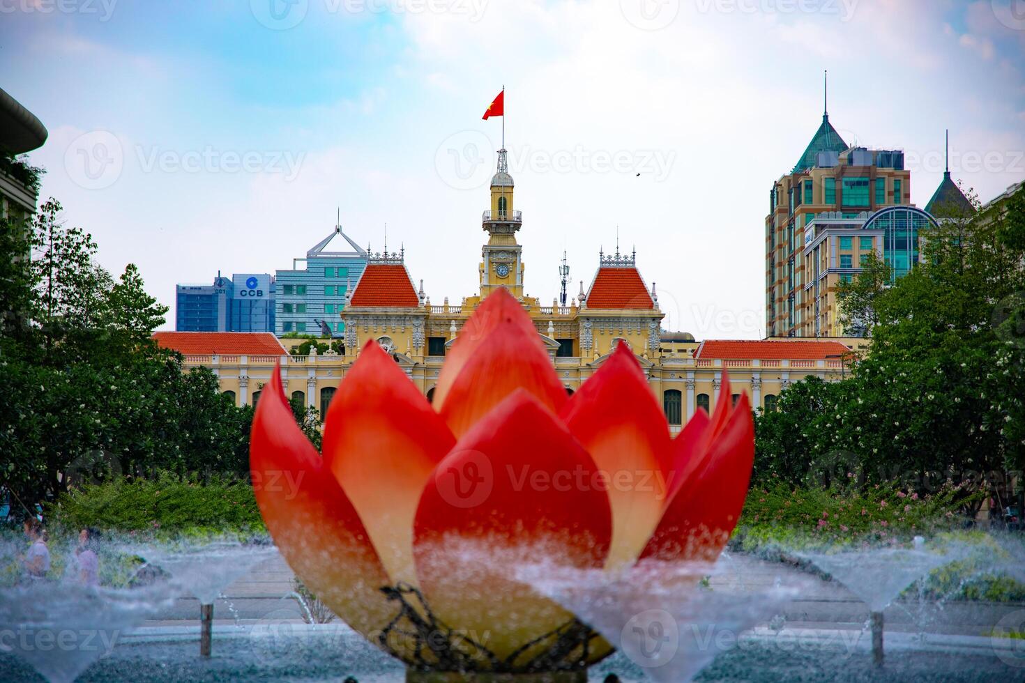 A fountain at the downtown at Nguyen Hue street in Ho Chi Minh long shot photo